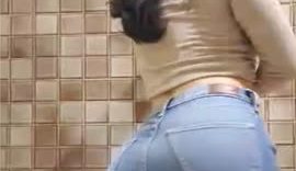 Showing-Off-Her-Ass-In-Tight-Denim-Jeans